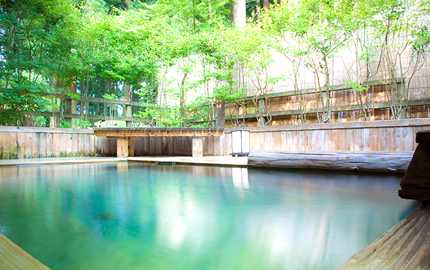 Open-air Onsen Bath enclosed by forest trees  Perfect way to relax your body and soul!